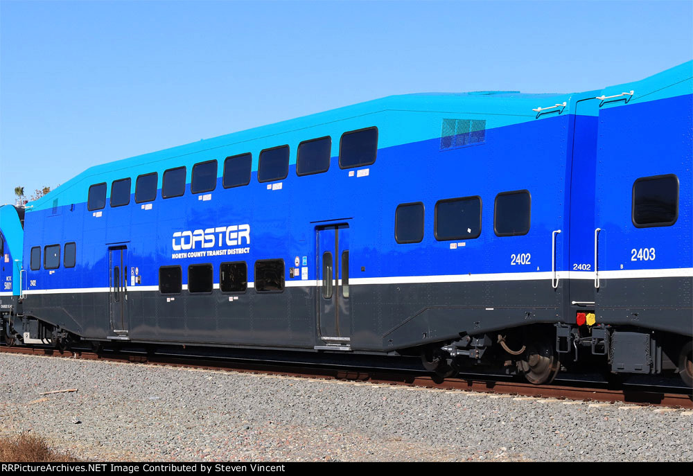 Repainted & rehabbed Coaster coach SDNX/NCTC #2402 in test train with Charger power.